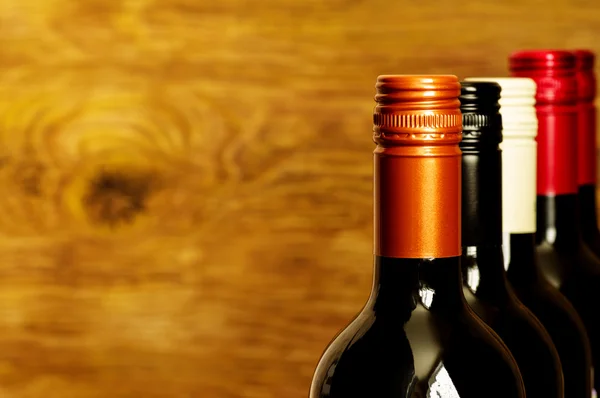 Tops of wine bottles with screw caps — Stock Photo, Image