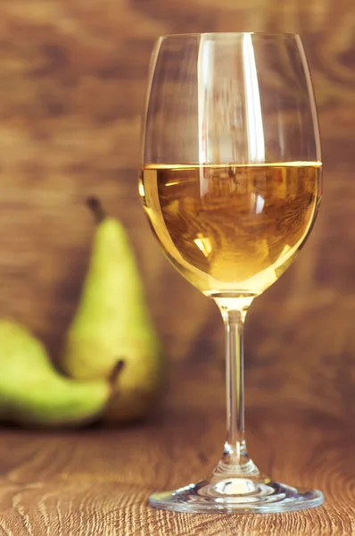 Glass of white wine still life with pears — Stock Photo, Image
