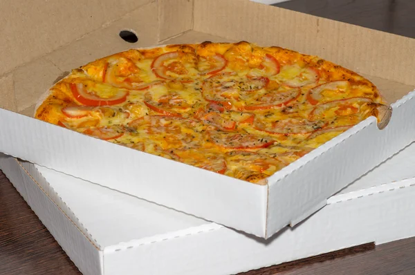 Pizza delivery in cardboard boxes — Stock Photo, Image