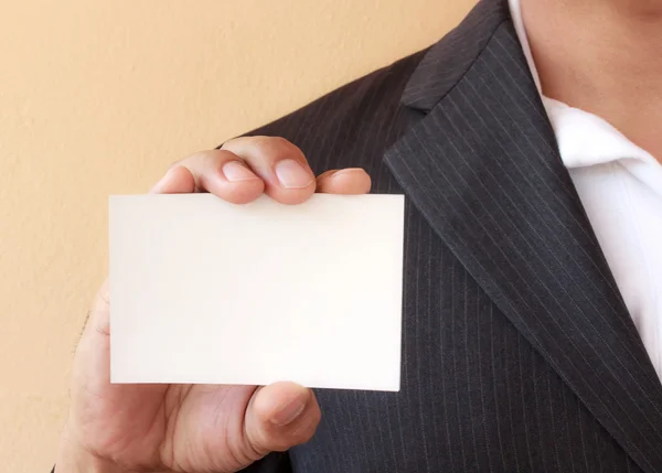 Hand holding a white card — Stock Photo, Image