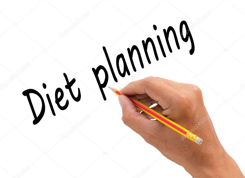Hand writing diet planning word with pencil