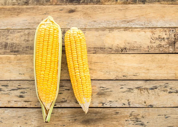 Fresh corn on wooden table background — Stock Photo, Image