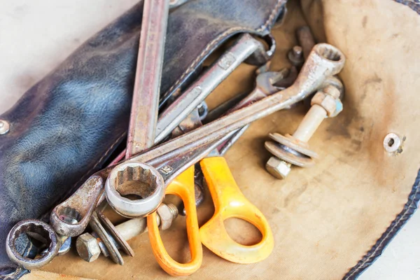 Set of tools in old leather bag — Stock Photo, Image