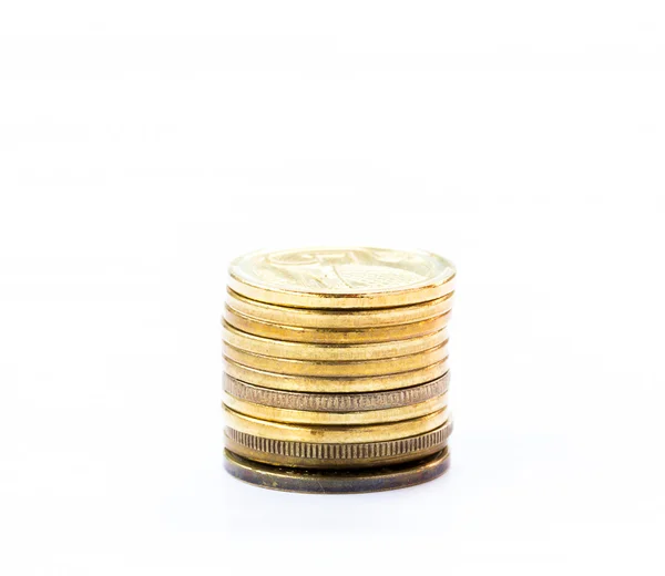 Stapels van munten op witte achtergrond — Stockfoto
