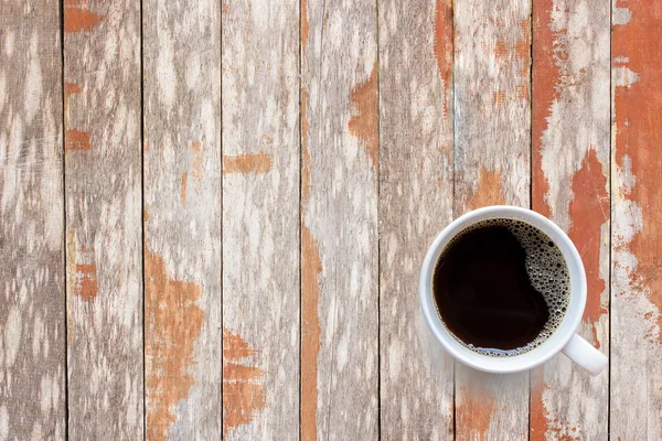Coffee cup on old wooden table background — Stock Photo, Image
