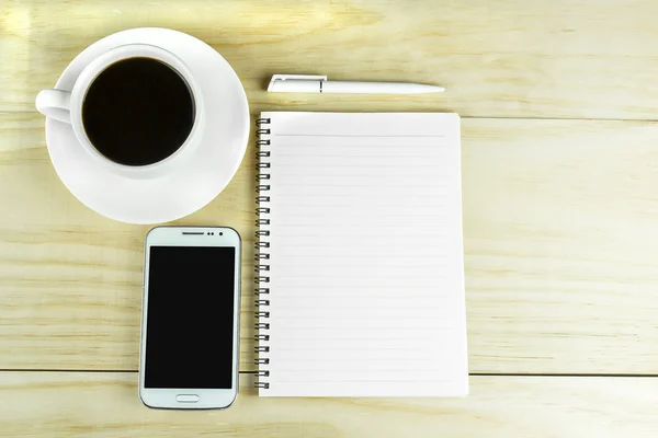 phone coffee and book blank on wood table top view