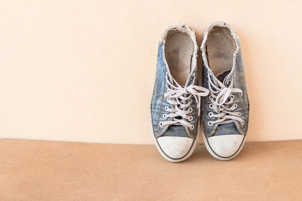 old shoes on wood background