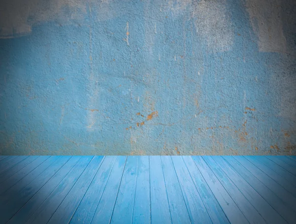 Wooden floor with blurred grunge background — Stock Photo, Image