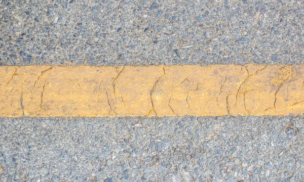 Yellow line on the road texture — Stock Photo, Image