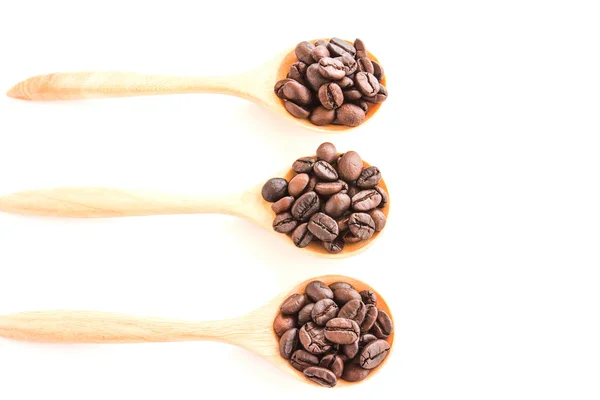 Coffee Beans in wooden spoon on white background — Stock Photo, Image