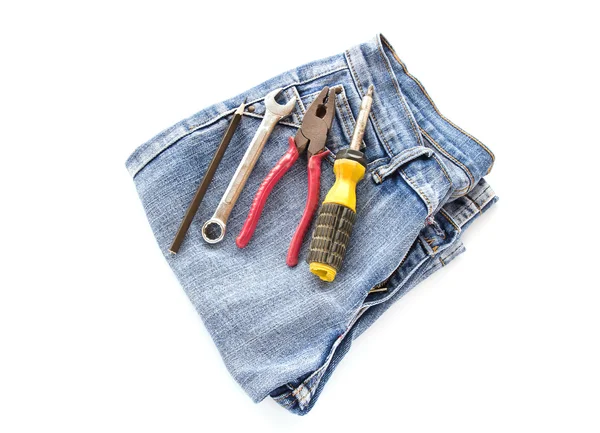 Blue jean and tools on white background — Stock Photo, Image