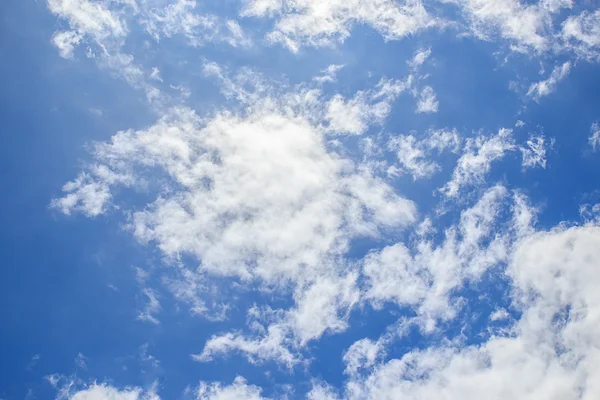 White clouds in the blue sky Stock Picture