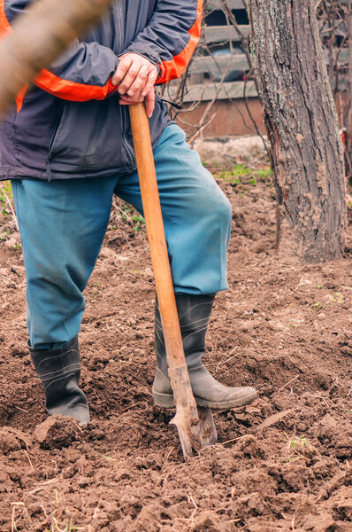 man with shovel
