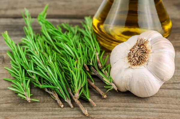 Rosemary, garlic and olive oil — Stock Photo, Image