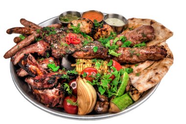 Beyaz et ve sebze tepsileri.