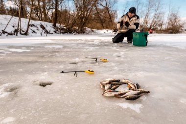 Buzda balık ve balıkçı avı, kış balıkçılığı