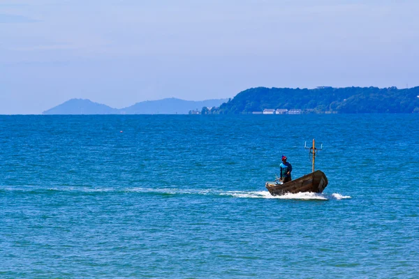 Fishing boat and fisherman — Stock Photo, Image