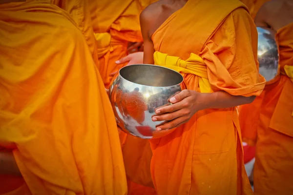 Buddhist monks with alms bowls — Stock Photo, Image