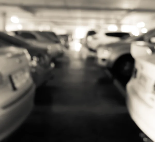 Sfocatura parcheggio con auto — Foto Stock