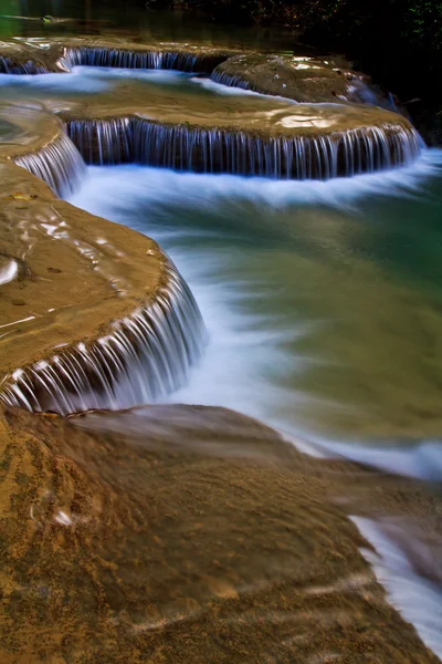 Waterfall and stream in forest — Stock Photo, Image