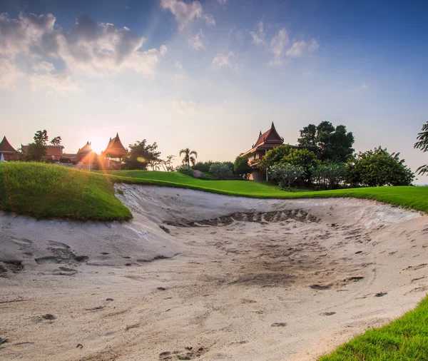 Zachód słońca na polu golfowym — Zdjęcie stockowe