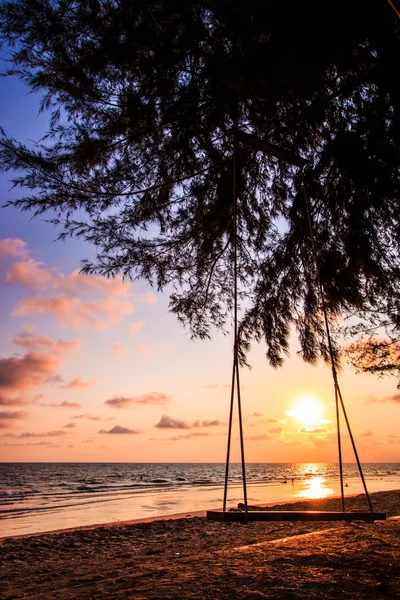 Swing on beautiful sunset at the beach — Stock Photo, Image
