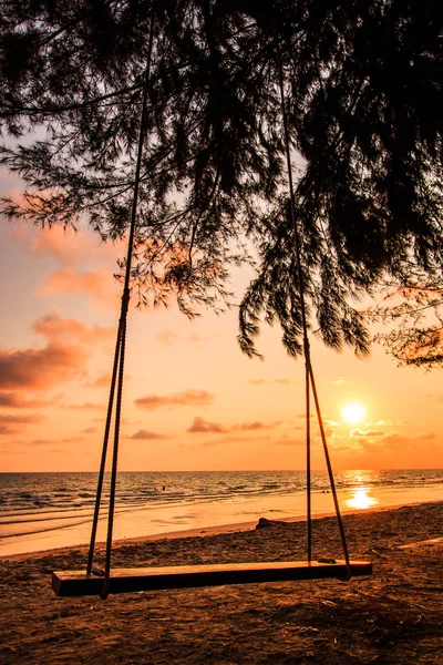 Swing on beautiful sunset at the beach — Stock Photo, Image