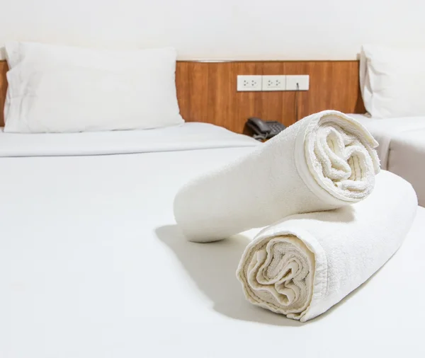 White bed and towels on the bed — Stock Photo, Image