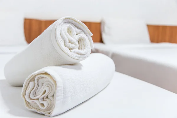 White bed and towels on the bed Royalty Free Stock Images