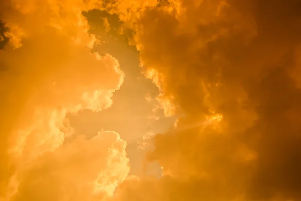 Rays of light shining through dark clouds — Stock Photo, Image