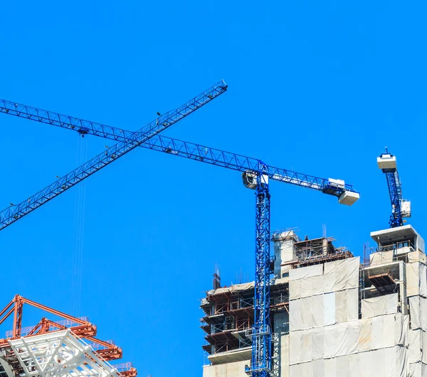 Construction site with cranes — Stock Photo, Image