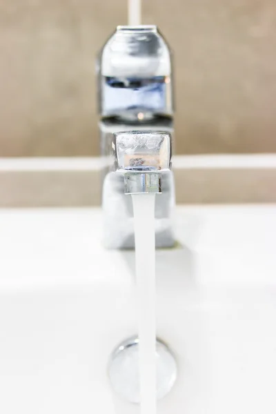 Faucet  Water splashing — Stock Photo, Image