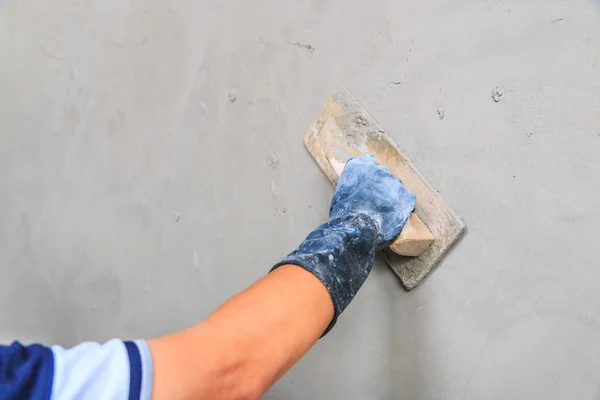 Mano de trabajador con paleta —  Fotos de Stock