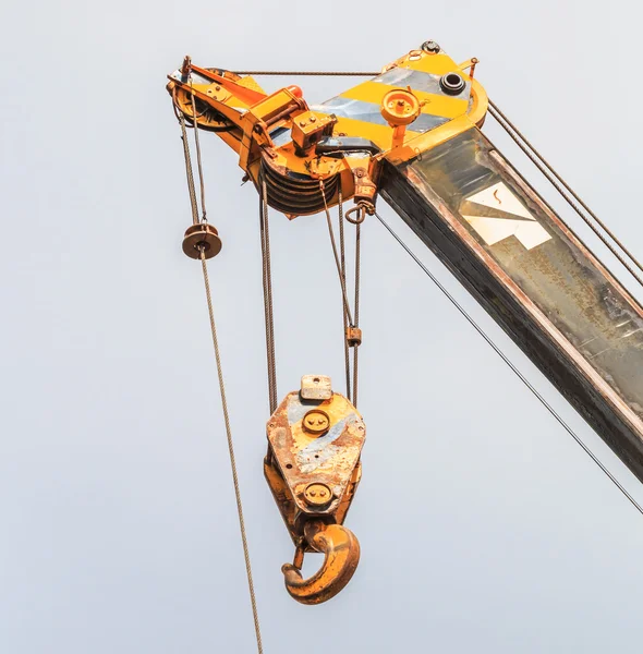 Yellow crane during work — Stock Photo, Image