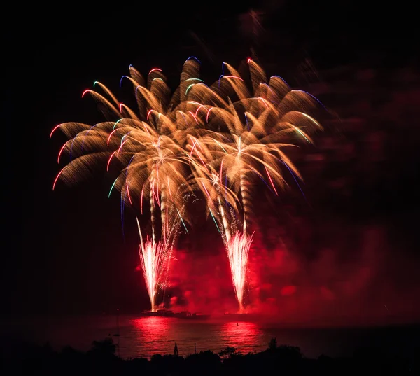 Beautiful colorful holiday fireworks — Stock Photo, Image