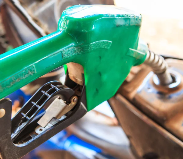 Fuel nozzle in car. — Stock Photo, Image