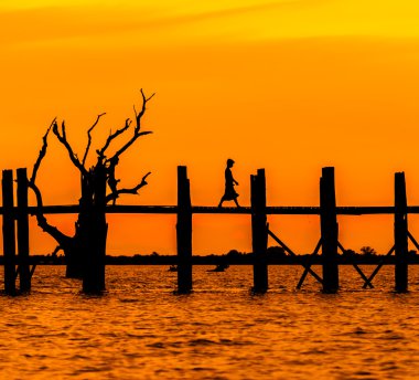 U Bein Bridge at sunset clipart