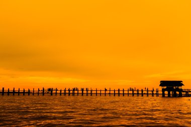 U Bein Bridge at sunset clipart