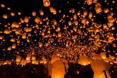 Floating lanterns and human hands clipart