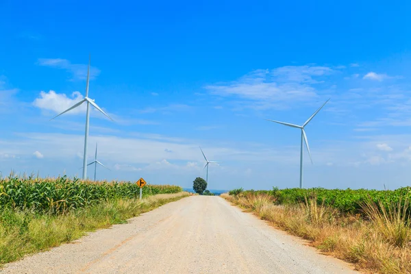 Wind turbines in field — Stock Photo, Image