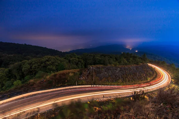 Asphalt road at sunrise — Stock Photo, Image