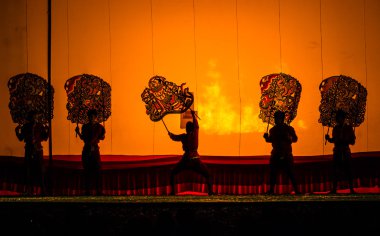 Shadow Play performed at Wat Khanon clipart