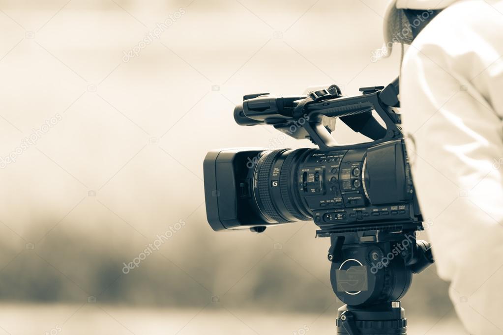 cameraman with video camera