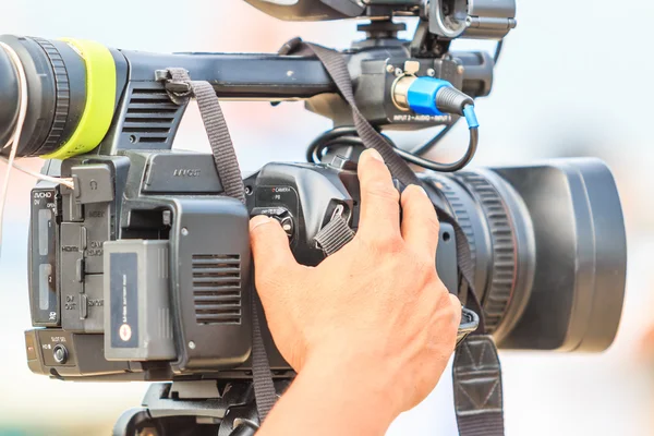 Cameraman with video camera — Stock Photo, Image