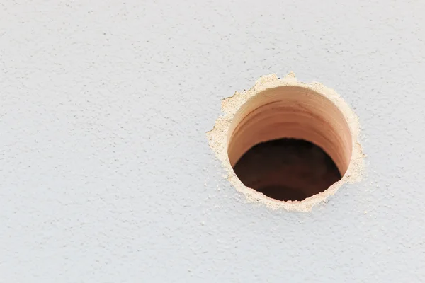 Agujero en fondo de pared — Foto de Stock