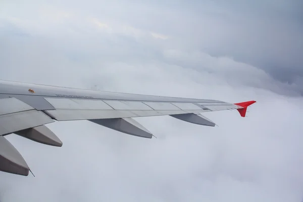 Airplane wing over sky — Stock Photo, Image