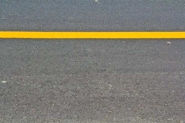 Yellow line on road — Stock Photo, Image