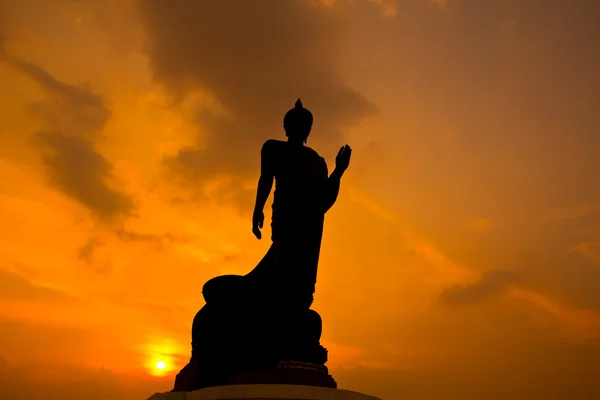 Buddha statue silhouette over sunset — Stock Photo, Image