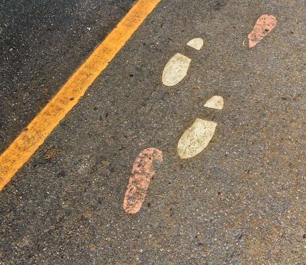 Ślady na asfalt — Zdjęcie stockowe