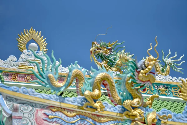 A dragon statue in a Chinese traditional art shrine